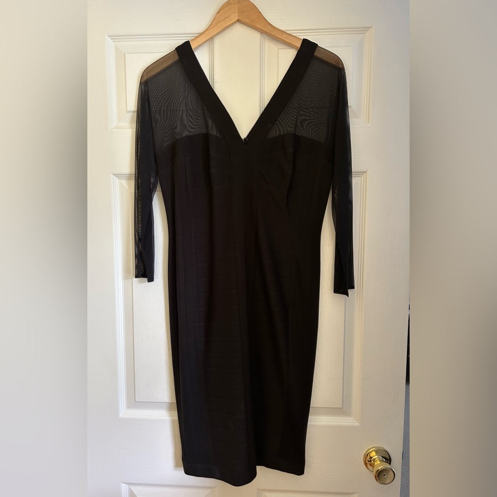 By Tadodi black long shear sleeve and low cut neck line